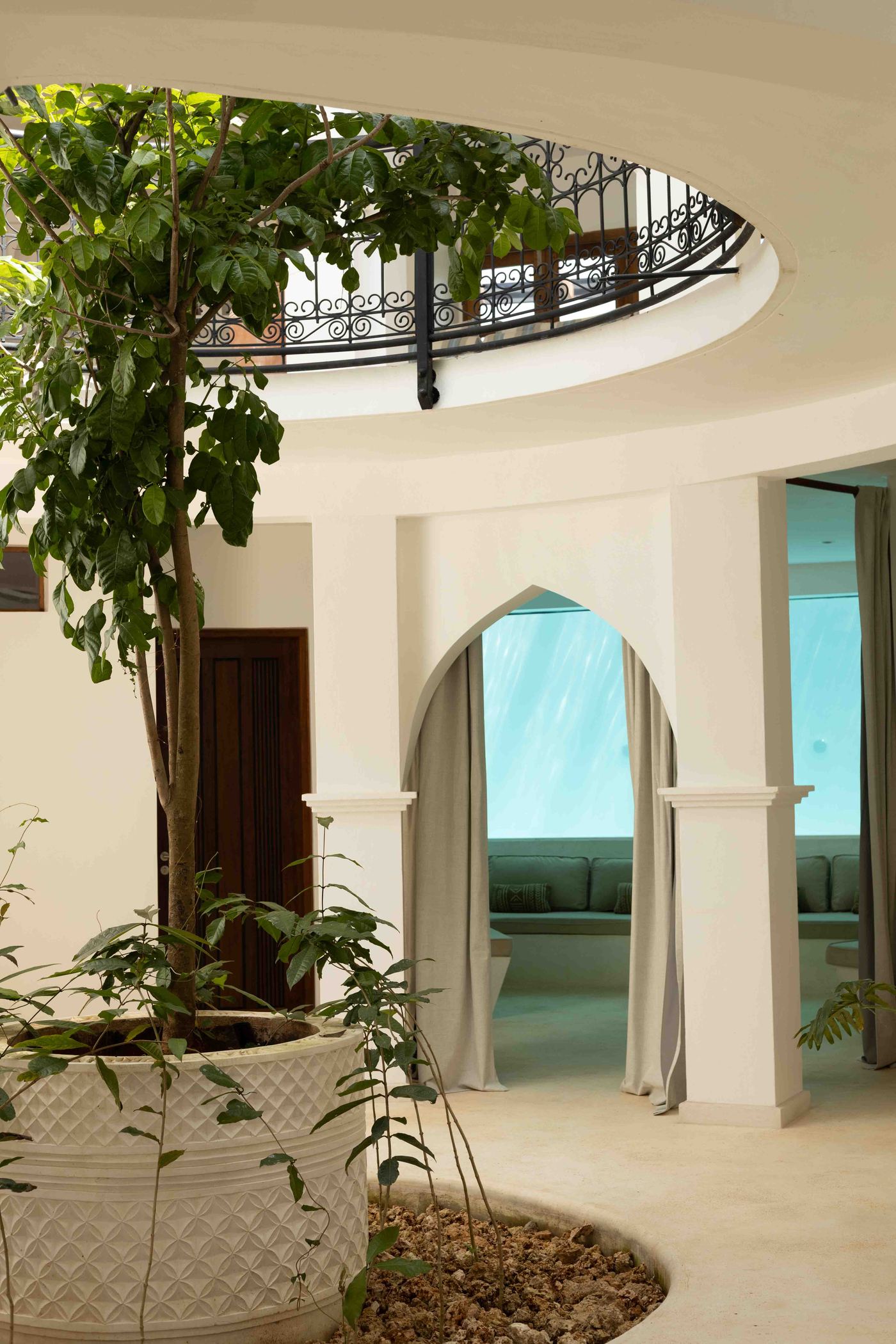 The open-sky atrium at the heart of Chez Donéo